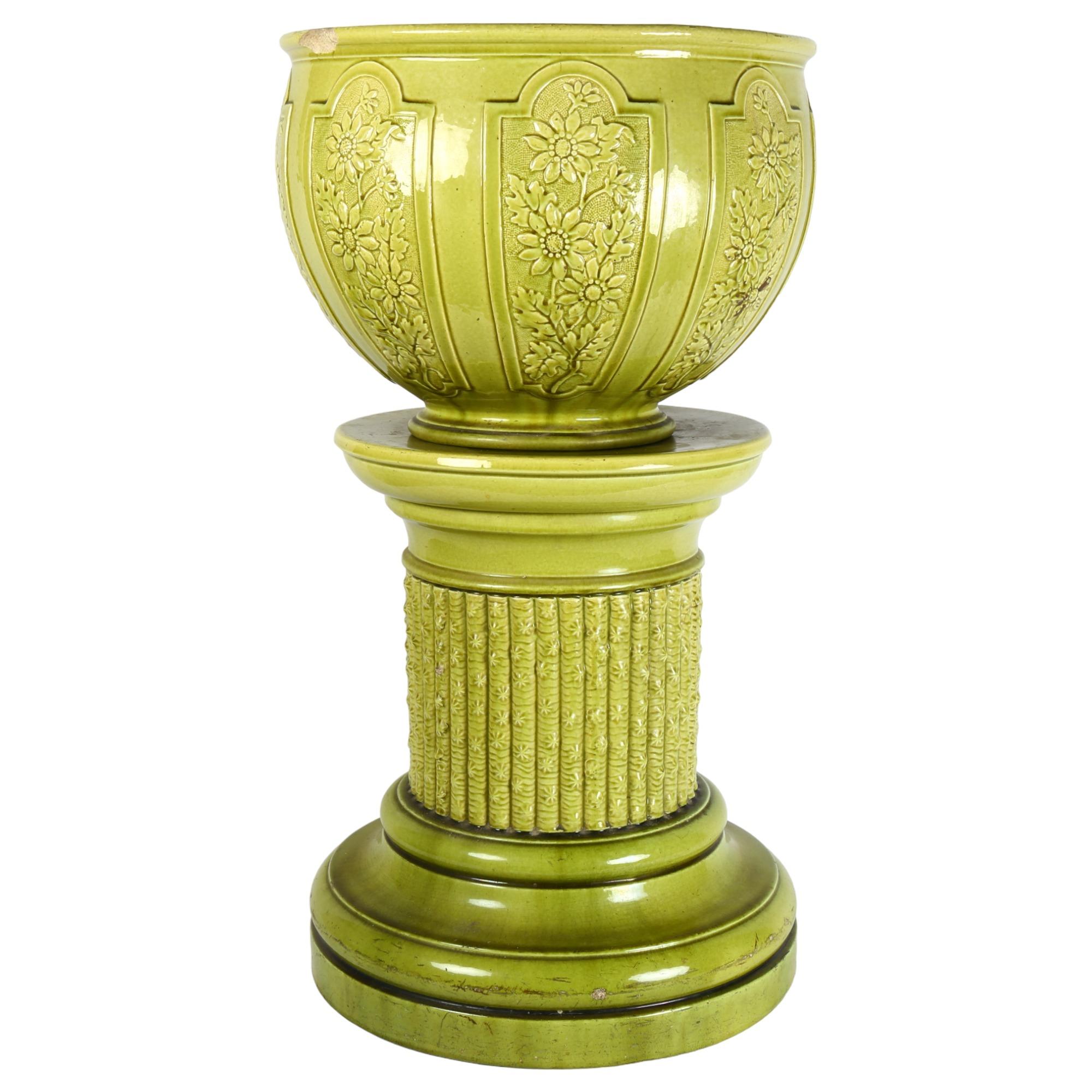 A Burmantofts faience jardiniere with pedestal stand, height 72cm, jardiniere width 38cm The