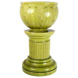 A Burmantofts faience jardiniere with pedestal stand, height 72cm, jardiniere width 38cm The