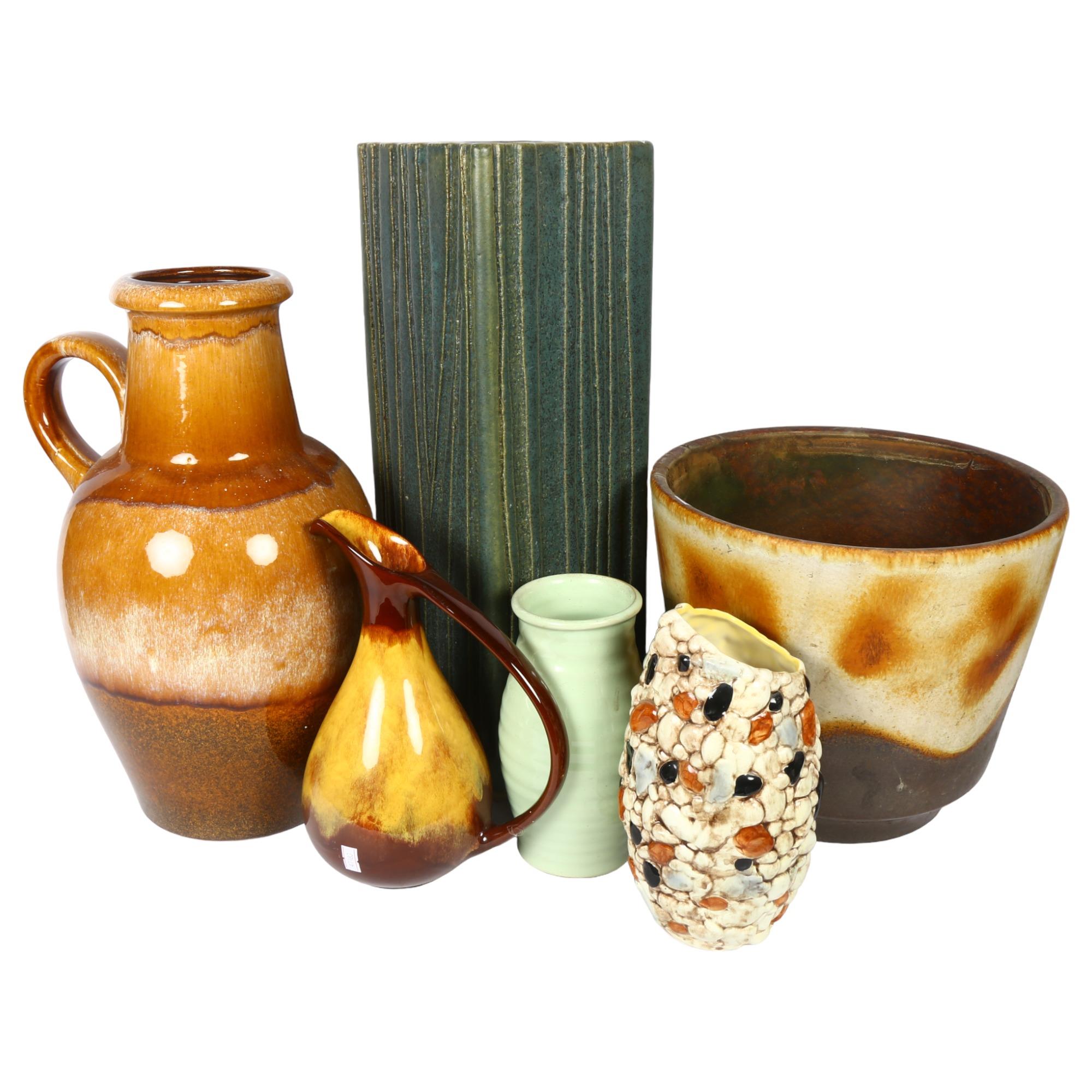 A large West German pottery jug, 42cm, a jardiniere, a Sylvac pebble vase, a slab vase etc