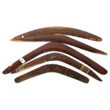 A group of 5 Australian boomerangs, 3 with carved and painted decoration, longest 64cm
