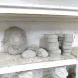 A concrete lion wall mask, 34x40cm, three happy face stone ornaments, and six pairs of feet stepping