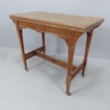 An Arts and Crafts style oak fold-over card table, with paper label for Kennard, cabinet maker of