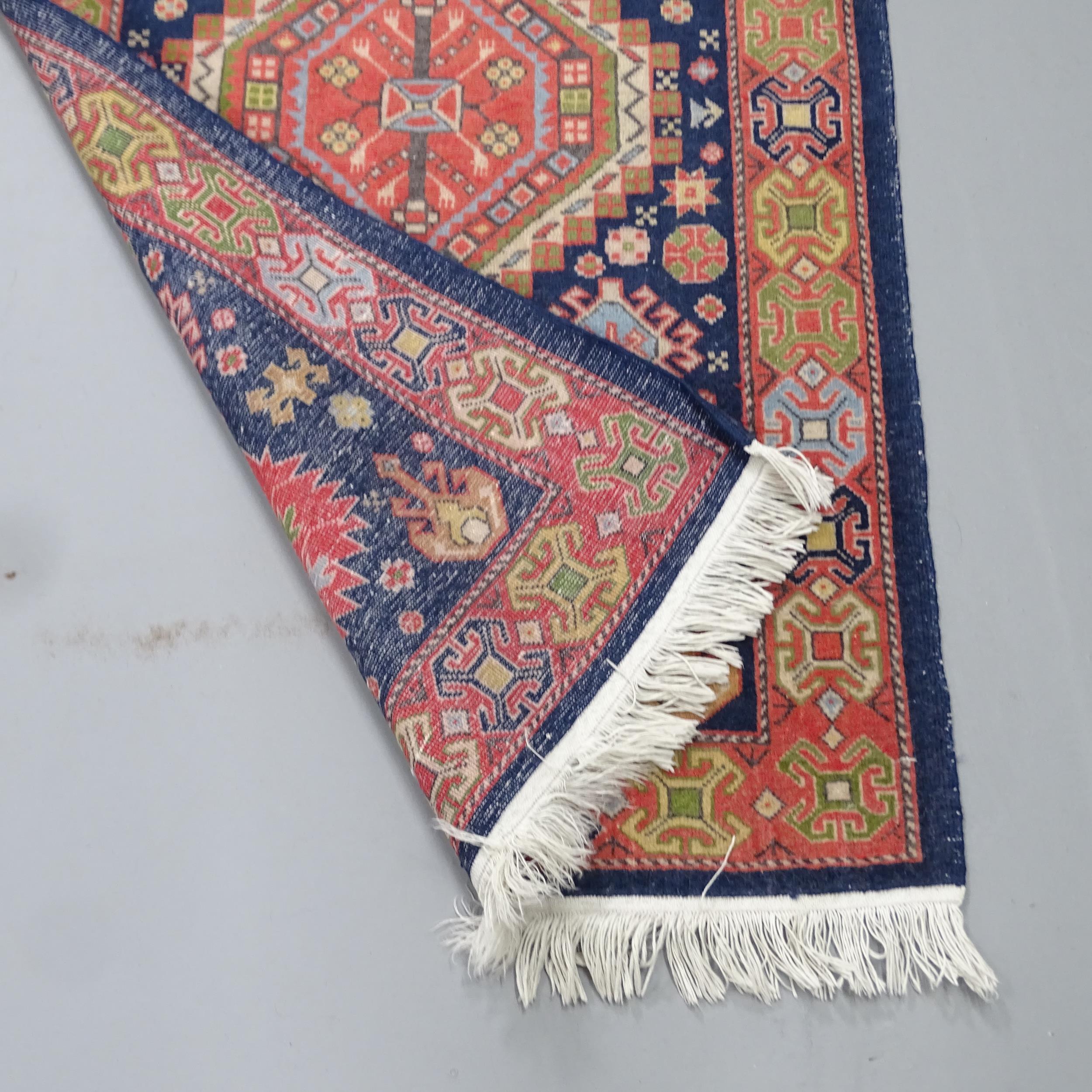 A hand-knotted Caucasian runner. 147x63cm - Image 2 of 2