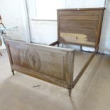 A French oak 4'6" double bed. General marks and scratches all over, and some water marks. Appears to