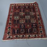 A hand knotted Bakhtiar garden carpet, approximately 80 years old. 195x148cm