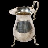 A George V silver cream jug, hallmarks for Chester 1924, maker's marks for Barker Brothers (