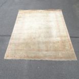 A cream ground Persian design carpet. 300 x 250cm.