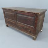 An antique stained pine mule chest. 118x65x48cm