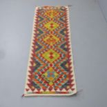 A Chobi Kilim runner. 198x62cm