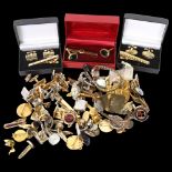 A quantity of cufflinks, tie pins etc