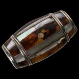A 19th century French tortoiseshell and white metal-mounted barrel-shape snuffbox, length 7.5cm