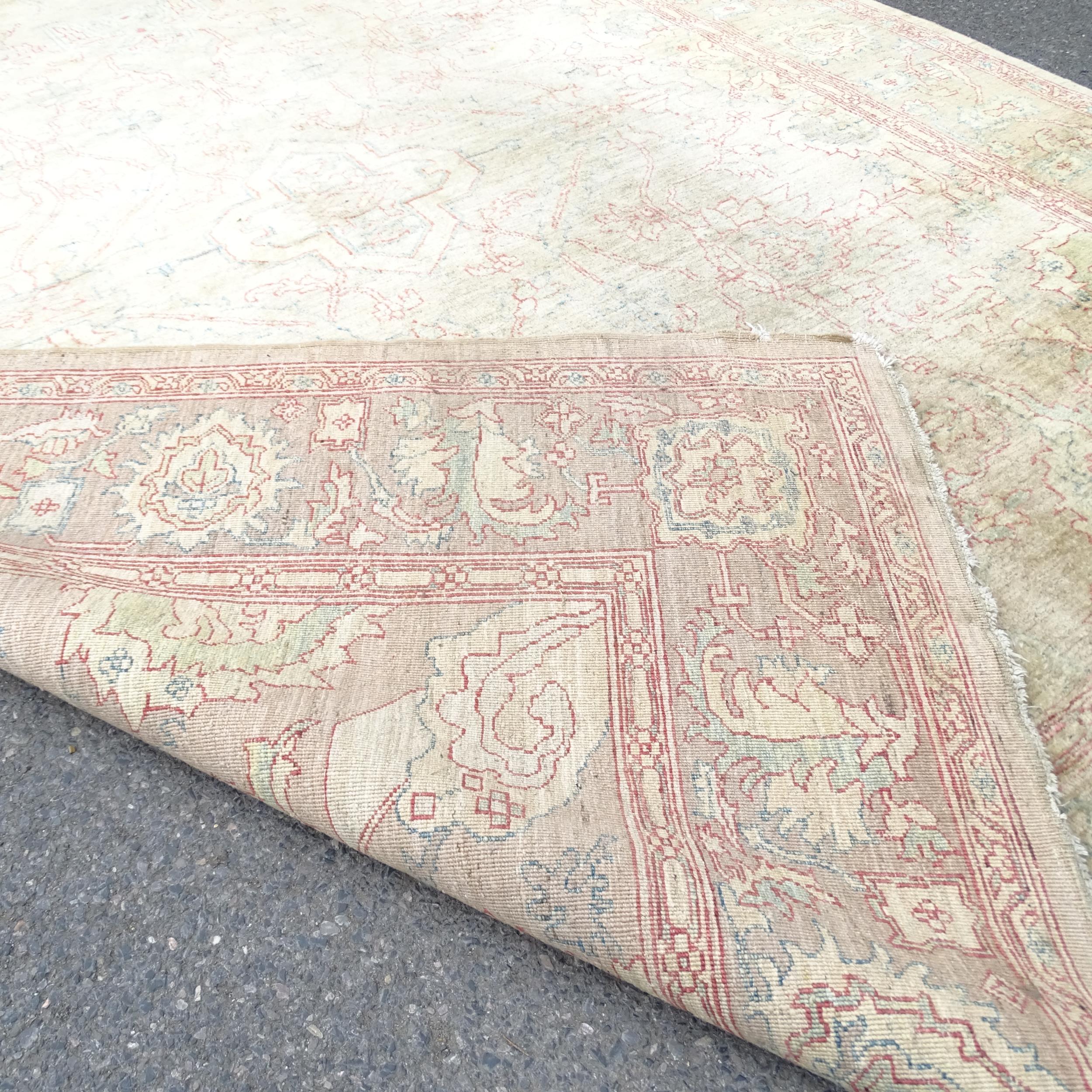 A cream ground Persian design carpet. 300 x 250cm. - Image 2 of 2