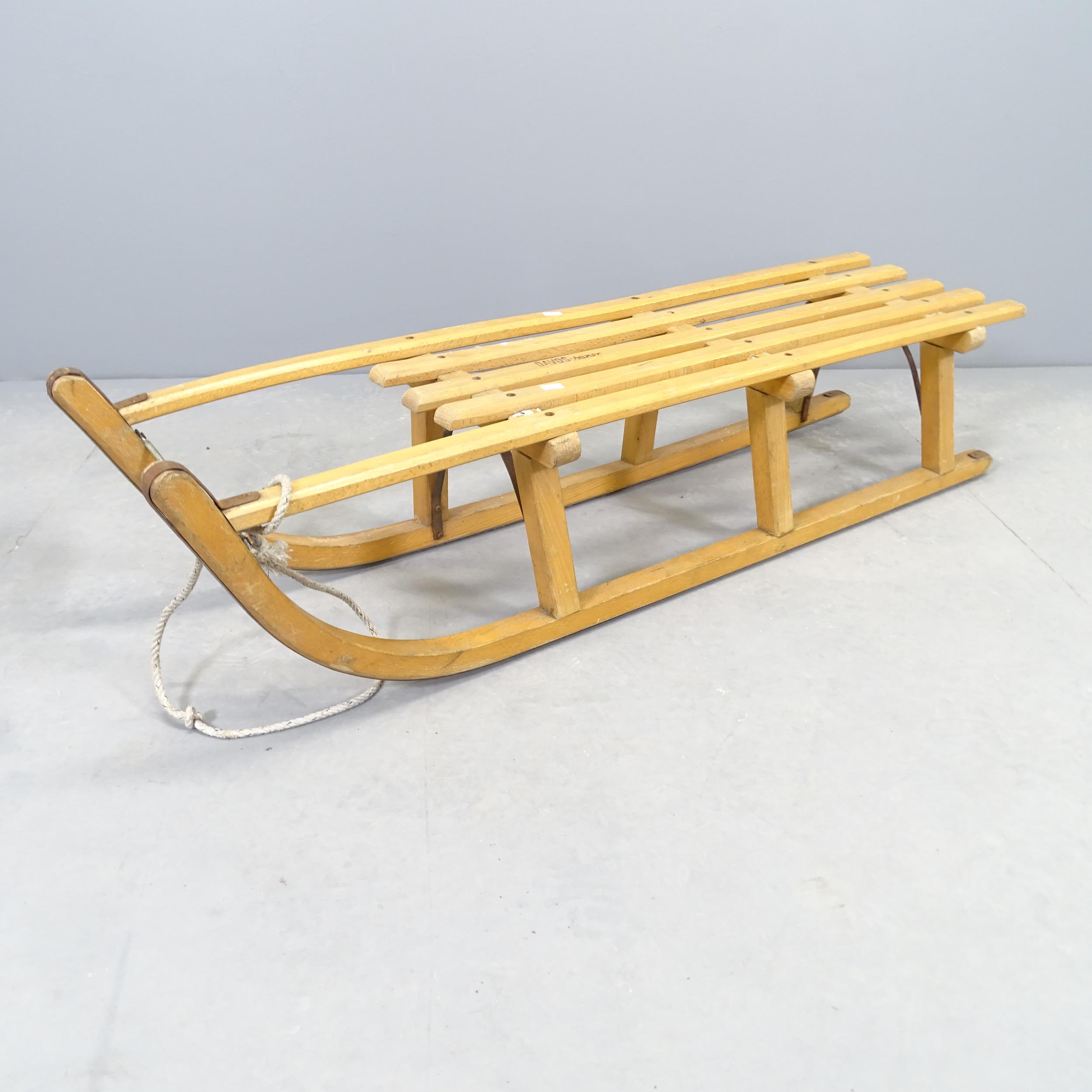 A vintage pine sledge. length 112cm