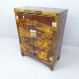 A modern Chinese lacquered cabinet. 59x78x29cm