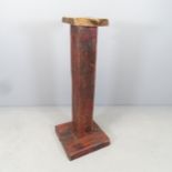 A reclaimed timber jardiniere stand with red stained column. 110cm.