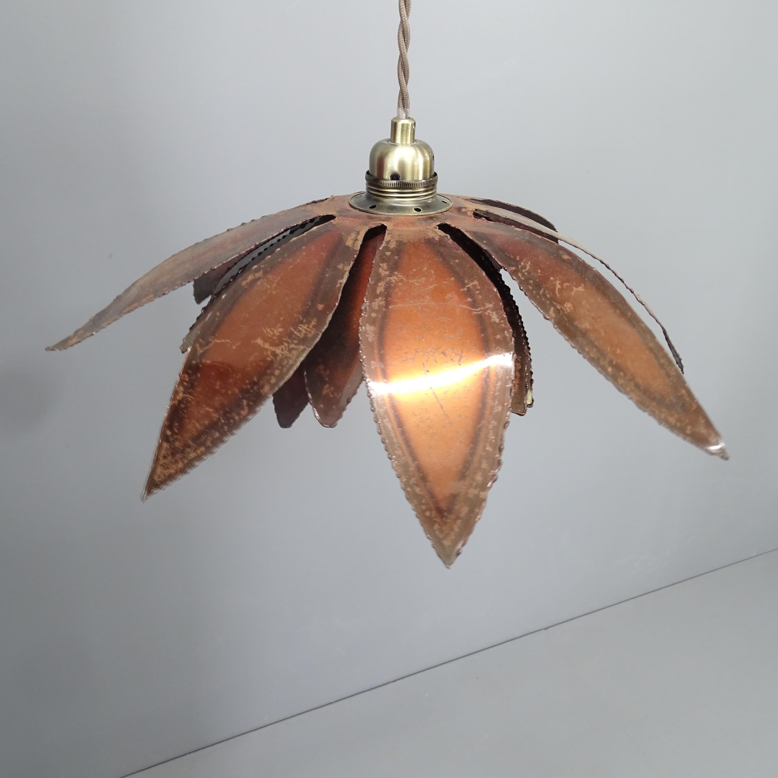 A hand made brutalist metal light fitting, circa 1970s', cut steel, bronzed flower shade, diameter