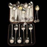 A cased set of 6 Edward VII silver teaspoons, a set of 10 silver teaspoons with bowling motif