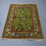 A Chinese silk rug with bird decoration. 185x122cm