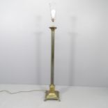 A 19th Century brass Corinthian column standard lamp on pedestal base. Height to bayonet 138cm.