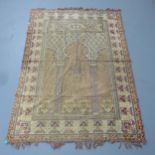 A cream ground Persian prayer rug. 192x122cm.