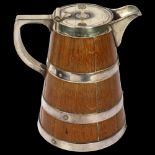 An Edwardian coopered oak water/ale jug with silver plated mounts, overall height 21cm