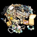 A boxed of mixed costume jewellery, stone necklace, wristwatches etc