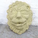 A concrete lion wall mask, height 54cm. pierced for use with a water feature.