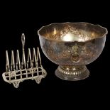 A silver plated 3-piece tea set, a silver plate on copper punch bowl, and a silver plated