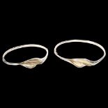 AAGAARD - a graduated pair of Danish sterling silver hinged bangles, modernist design