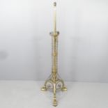 A Victorian brass standard lamp, converted from oil lamp. Height to bayonet 145cm. requires re-