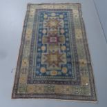 An early 20th century Caucasian Shirvan rug in muted colours with soft wool. 158x97cm