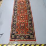 A Persian Sarouk runner. 348x90cm