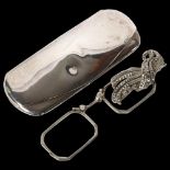 A George V silver spectacle case, length 11cm, 1.9oz gross, together with a pair of marcasite