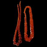 2 phenolic amber necklaces, 1 oval disc design, length 59cm, and a bead design, length 71cm (the