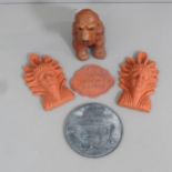 Three terracotta garden wall plaques, another and a statue of a dog (5)