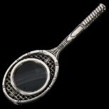 VALENTI, SPAIN - a stylised silvered hand magnifying mirror, incised Asprey Pic to the handle,