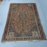 A red-ground Qashqai carpet. 240x156cm.