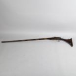 An 18th century Afghan flintlock camel rifle, length 157cm All appears to be original, the lock