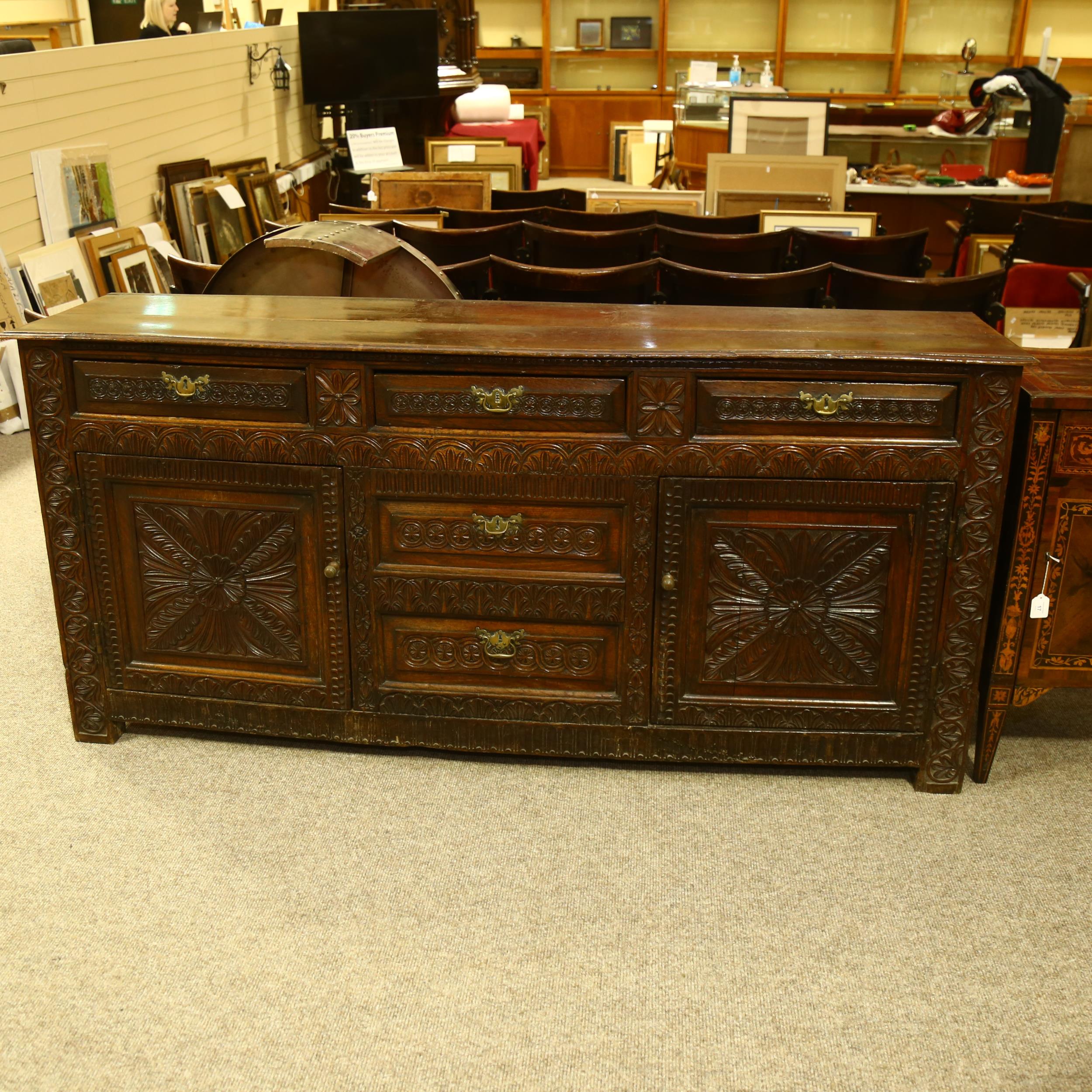 An 18th century oak dresser base, 3 carved frieze drawers with central dummy drawers below flanked - Image 2 of 6