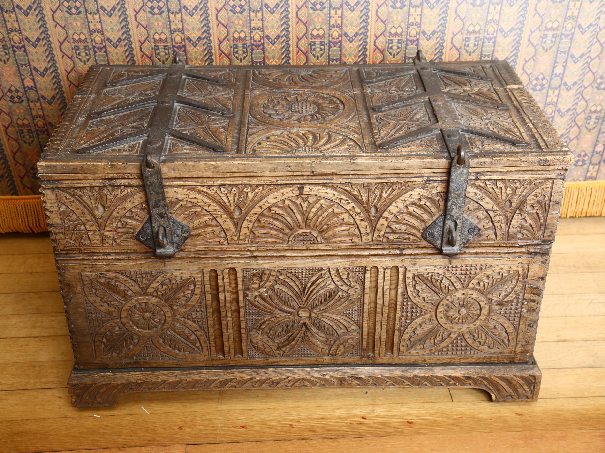18th century Continental oak chest, heavy iron strapwork hinges and hasps to the lid, allover chip