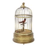 A clockwork bird-in-a-cage automaton, height excluding ring handle 28cm, working order Slightly