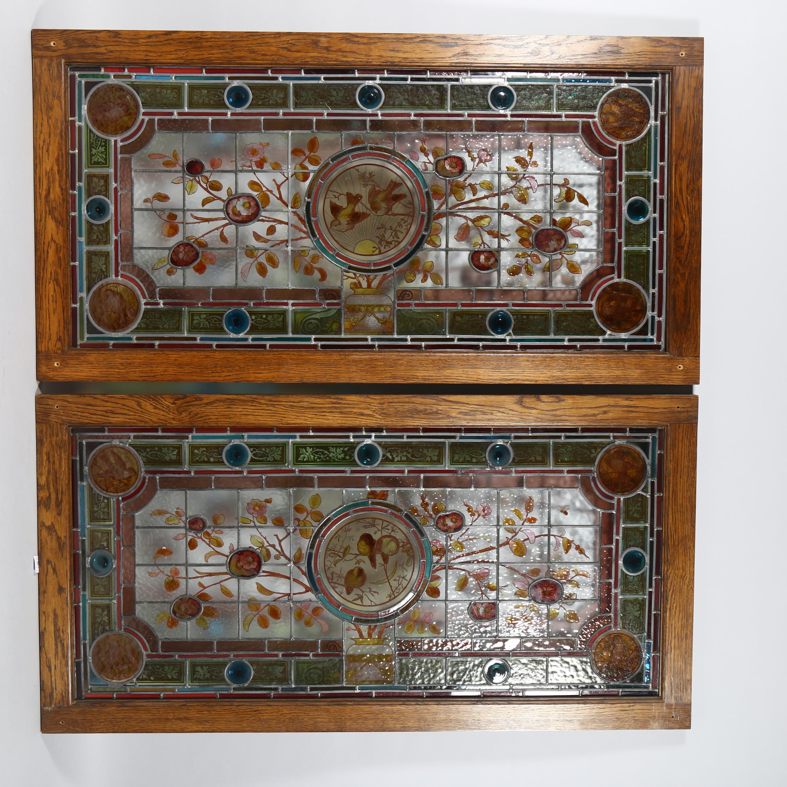 Pair of Victorian Aesthetic Movement stained glass leadlight window panels, with hand painted garden