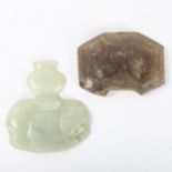 A Chinese carved jade elephant amulet, and a lavender jade furniture mount, width 9cm (2) Elephant