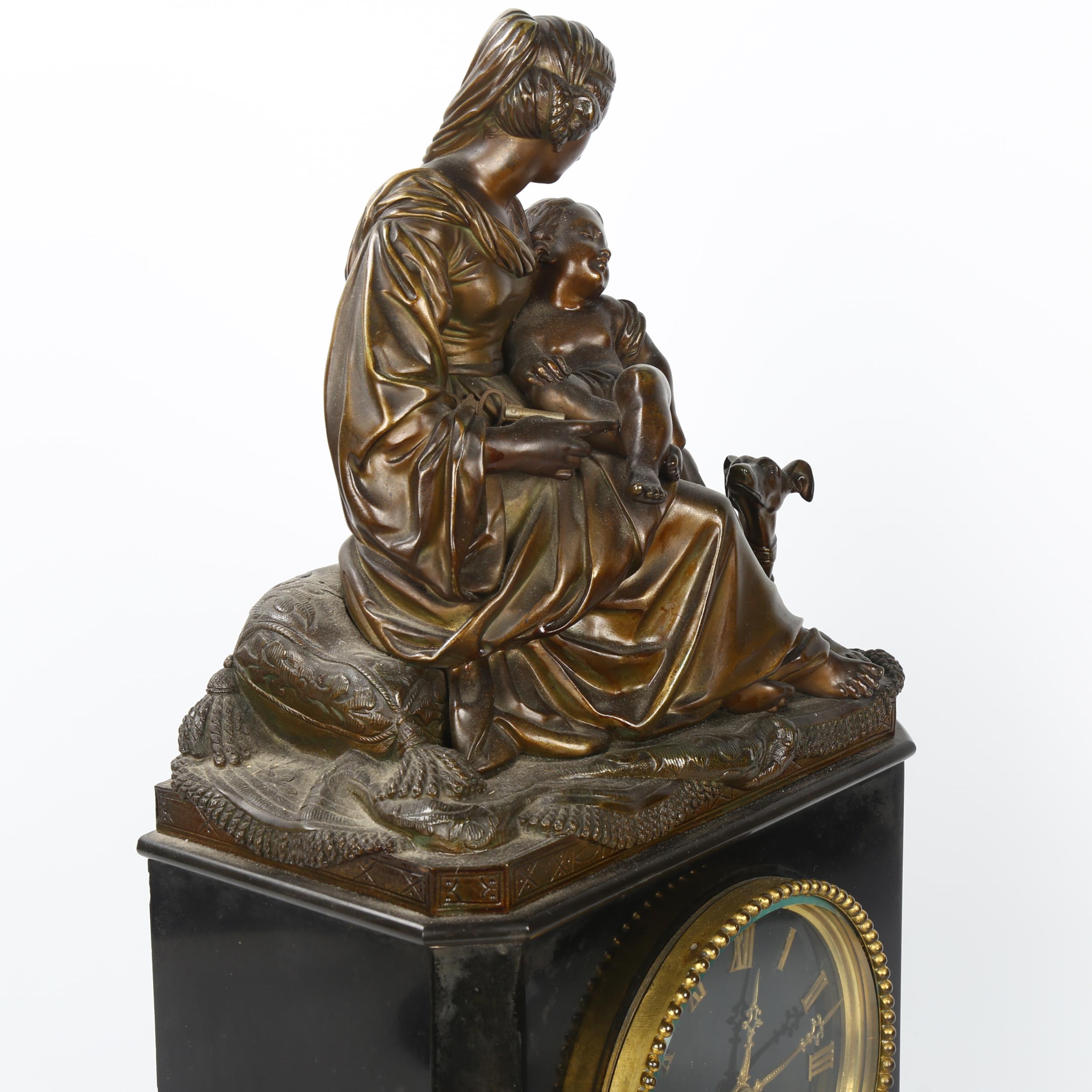 A 19th century ormolu mounted slate-cased mantel clock, surmounted by a gilt-bronze woman and child, - Image 5 of 5