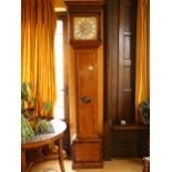 An 18th century walnut and marquetry cased 8-day longcase clock, the 12" square brass dial having