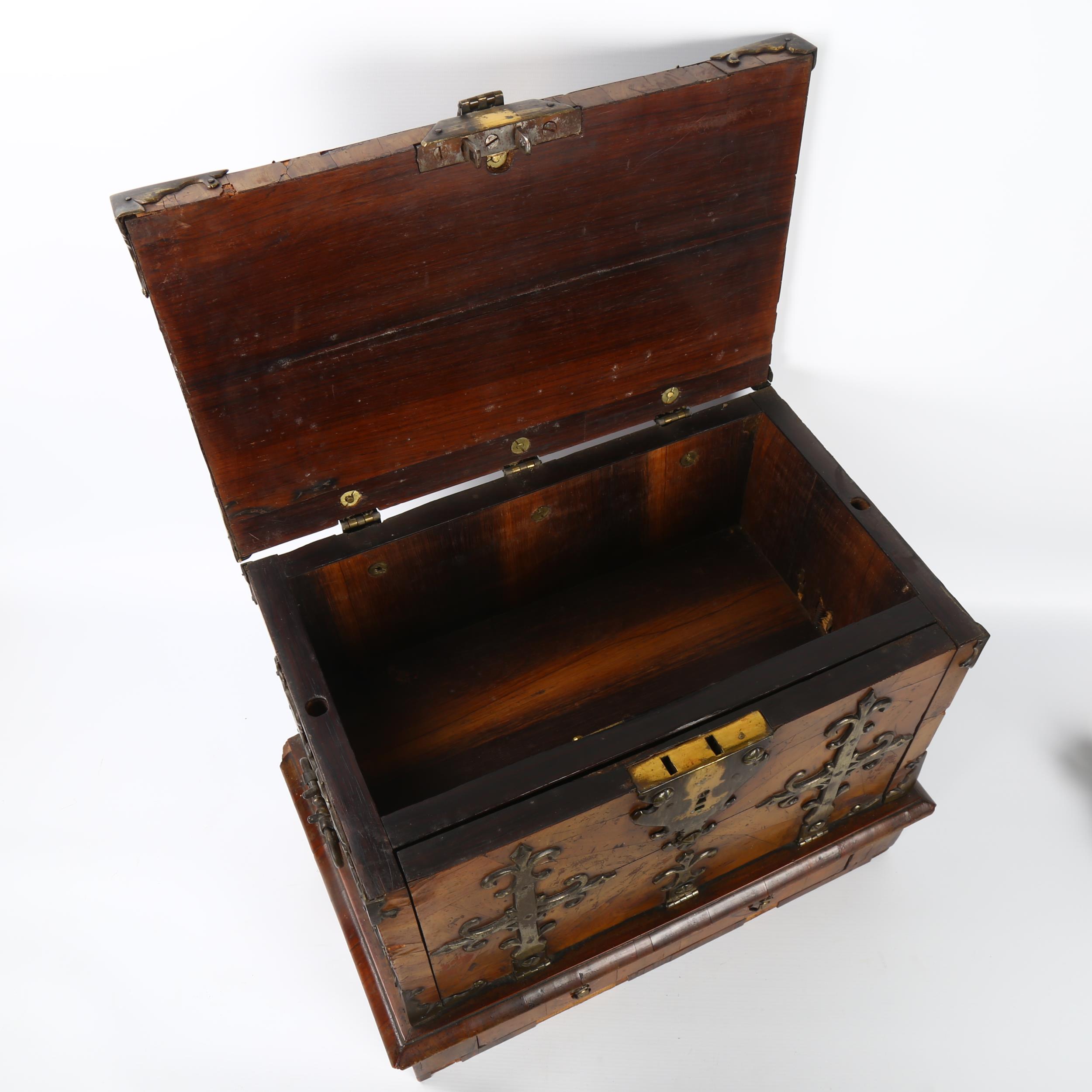 A small 18th century Gothic brass-bound walnut travelling chest, allover heavy brass strapwork - Image 3 of 6