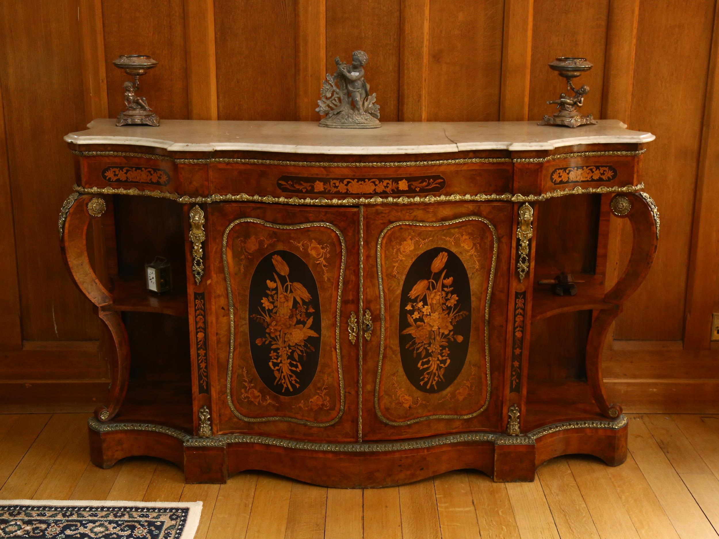 A French Napoleon III Empire style credenza, shaped serpentine form, walnut and kingwood, with