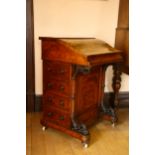 A Victorian burr-walnut Davenport, with slope front, hinged stationery rack backing, 4 side
