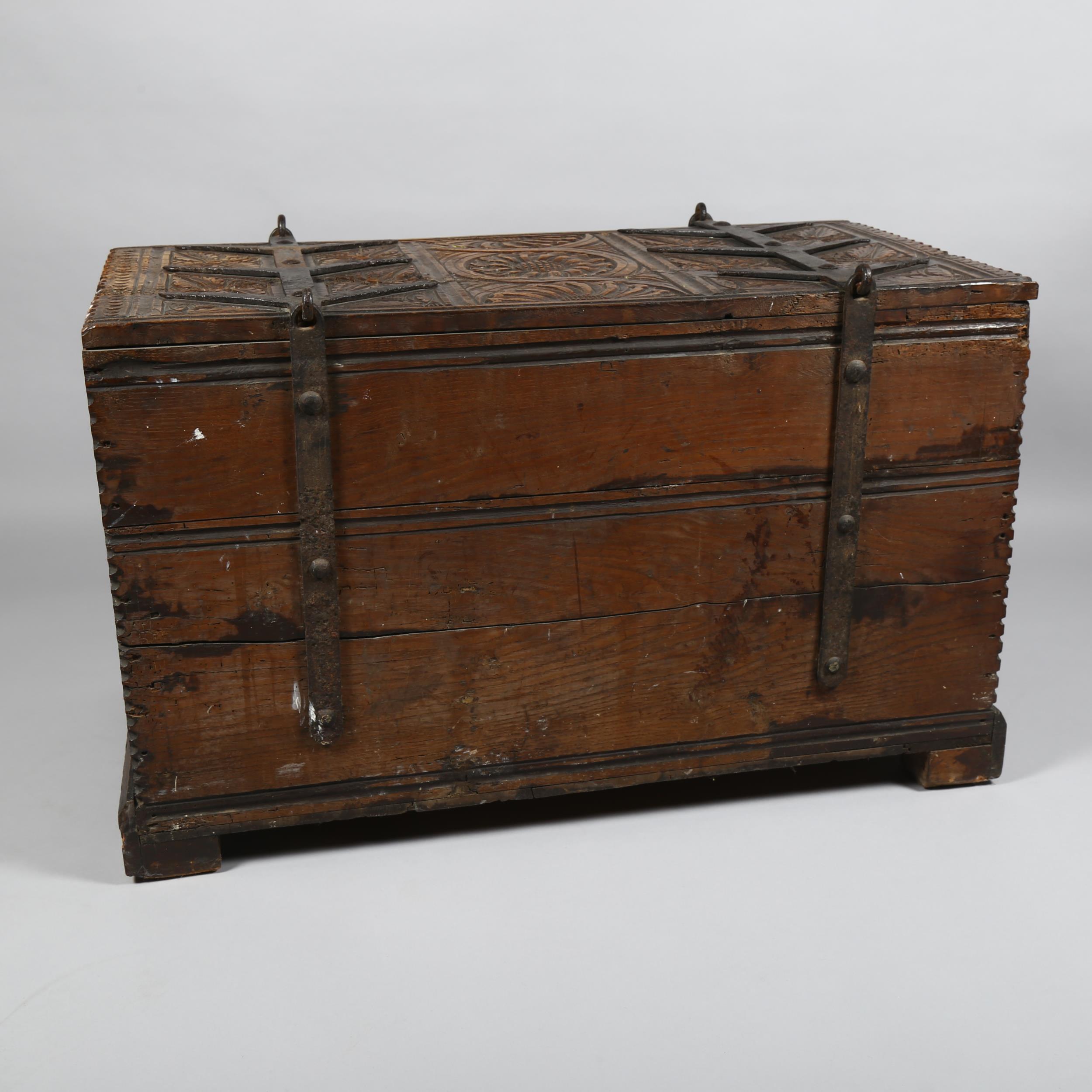 18th century Continental oak chest, heavy iron strapwork hinges and hasps to the lid, allover chip - Image 5 of 6