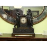 A 19th century French patinated bronze-cased 8-day mantel clock, surmounted by Classical temple